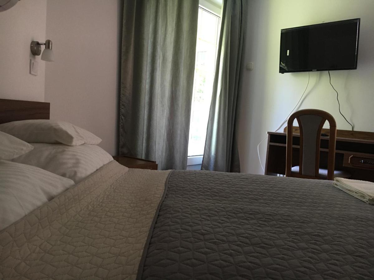 Center Apartmanhaz Hotel ไฮจ์ดุสโซบอสโล ภายนอก รูปภาพ